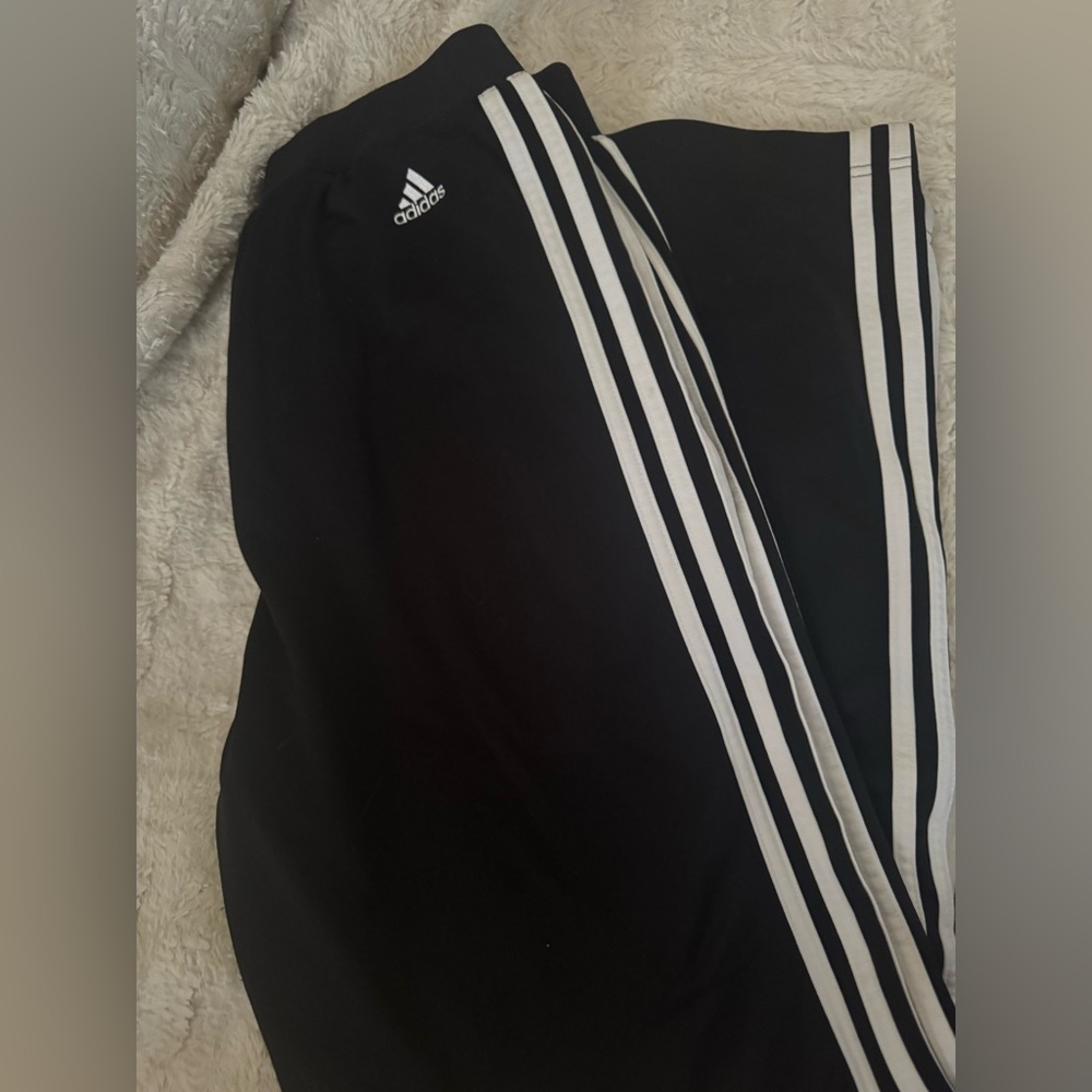 Adidas Black and White Sweatpants with Iconic Stripes